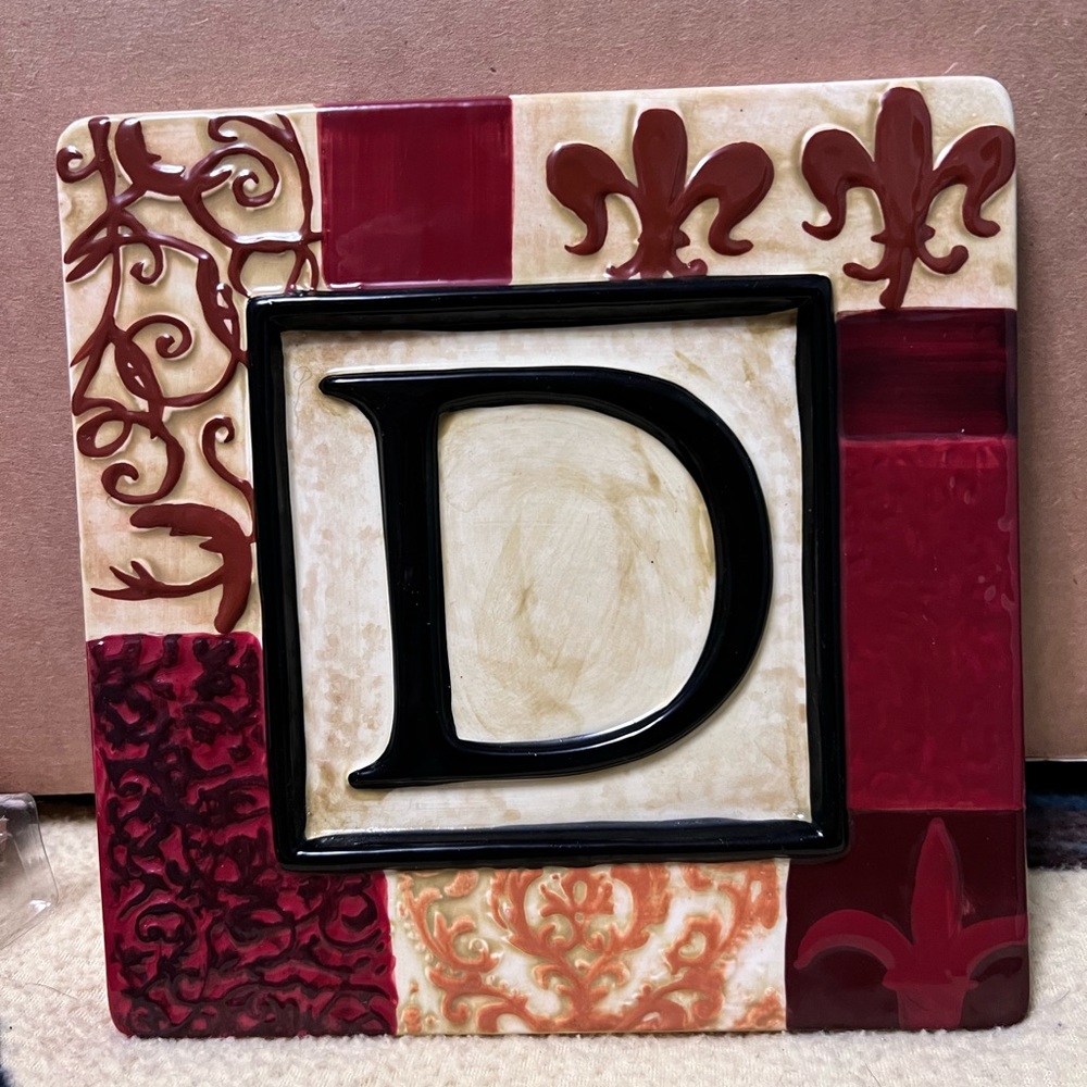 Kirkland’s Monogram ceramic wall plaque. D. 7 ½” x 7 ½”. Never used.